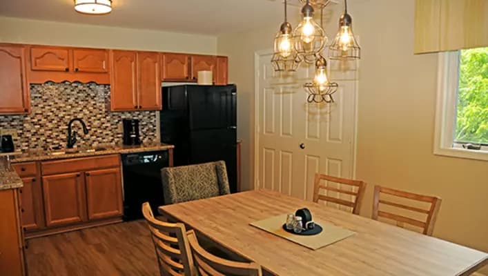 Full kitchen and dining area