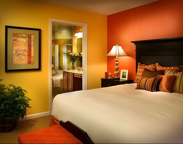 Master bedroom with king bed at Vacation Village at Williamsburg